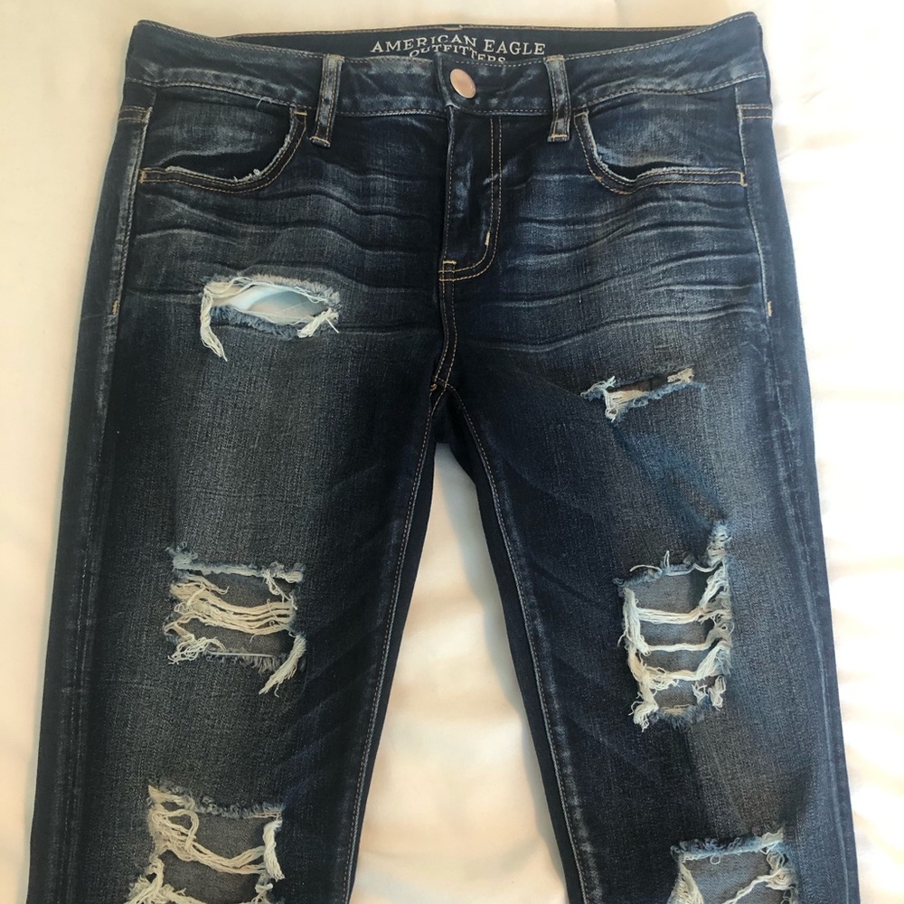 High-Waisted Ripped Jeans